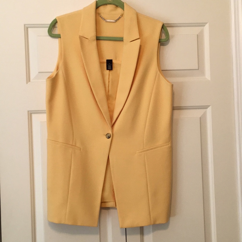 Long yellow vest from White House Black Market. Size 12. Like new condition.
